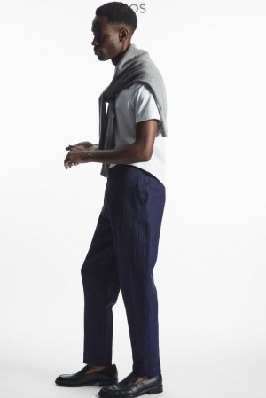 COS Tapered Textured-Seersucker Trousers Men's Trousers Navy / Checked | UU43-E2OZ